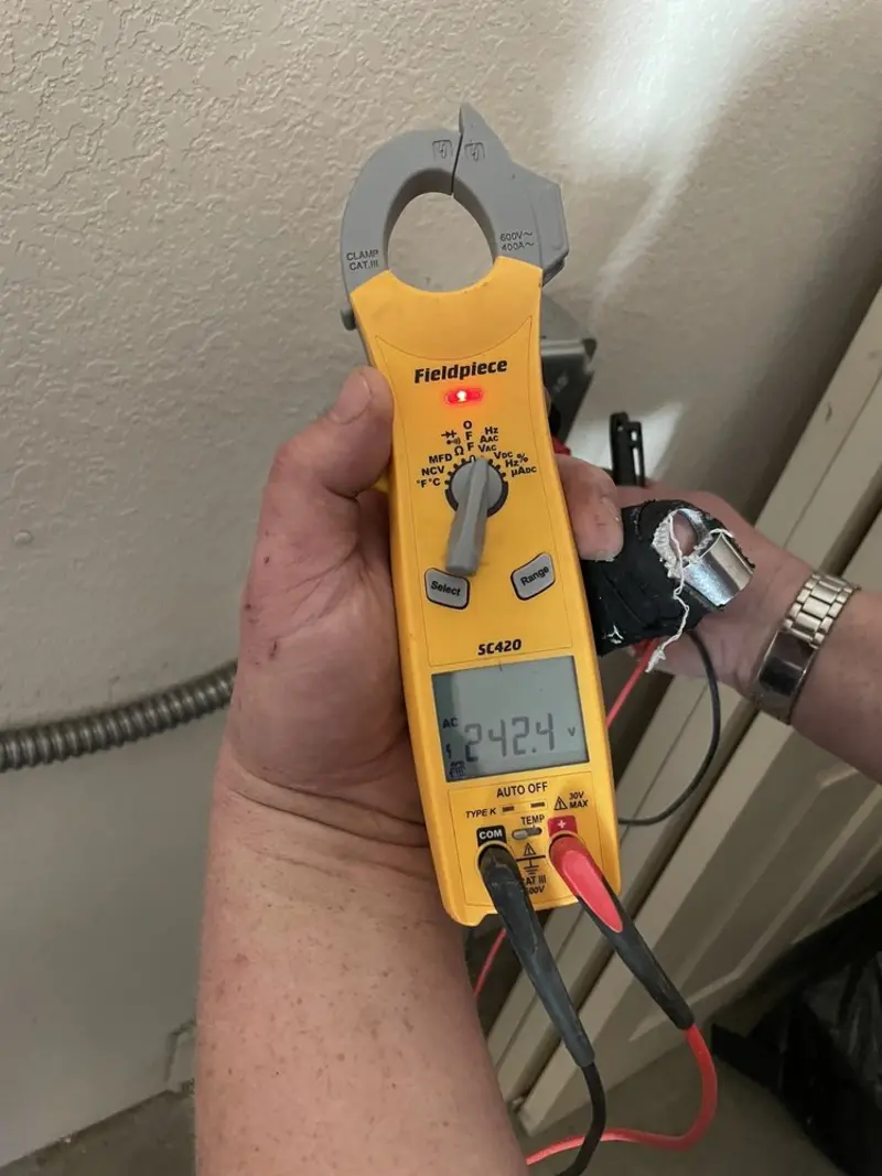 Voltage testing with clamp meter during Aluminum Wiring Replacement in Roanoke